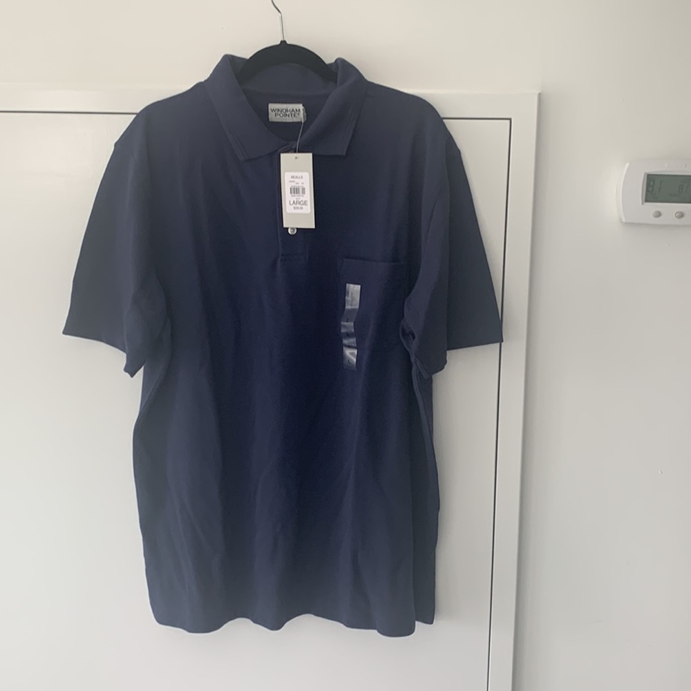Windjammer pointe collar polo. Short sleeves. 30” long from the back.
